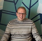 A man wearing glasses.