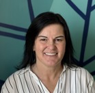 Jamie Kruse smiling for the camera.