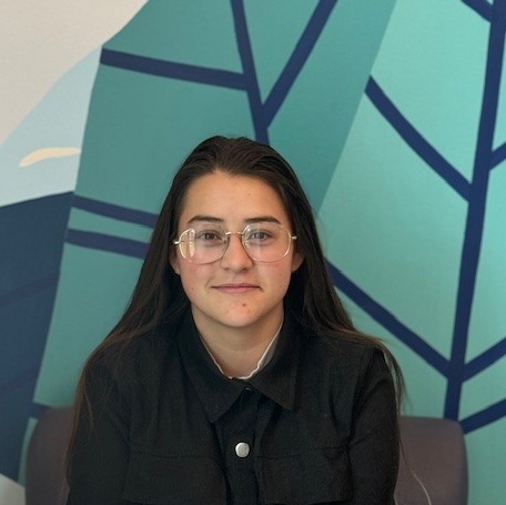 A woman wearing glasses.