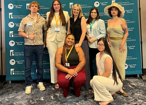 A group of people posing for a photo.