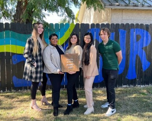 A group of people posing for a photo.