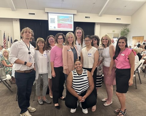 A group of women posing for a photo.