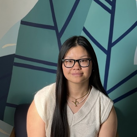 A woman wearing glasses.