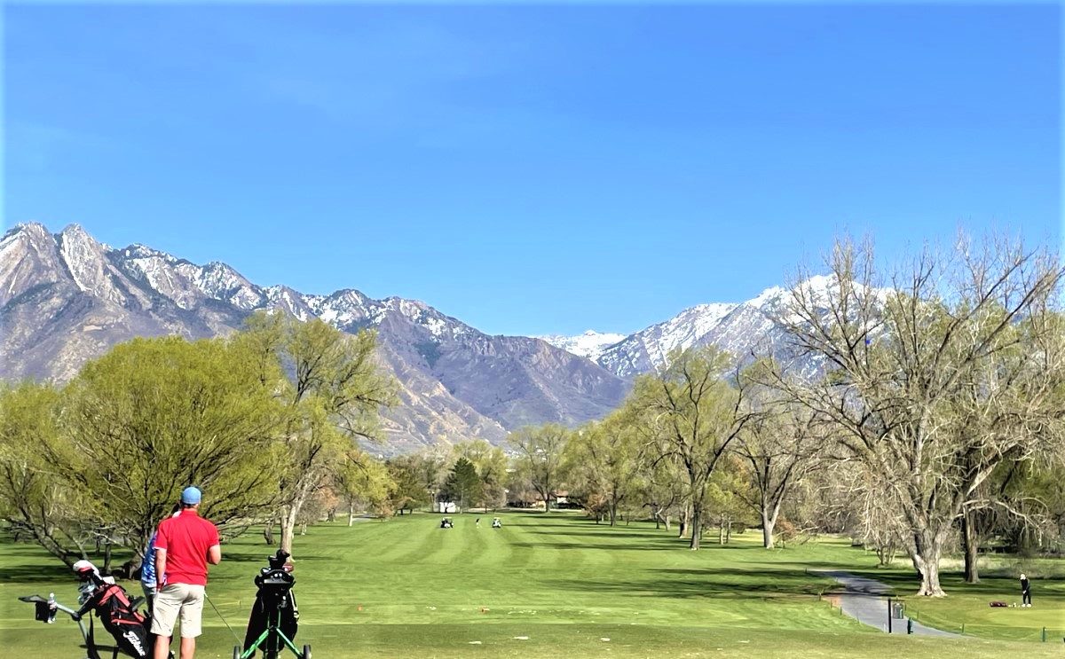 A person playing golf.