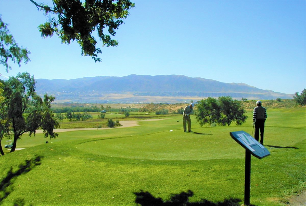 A person playing golf.