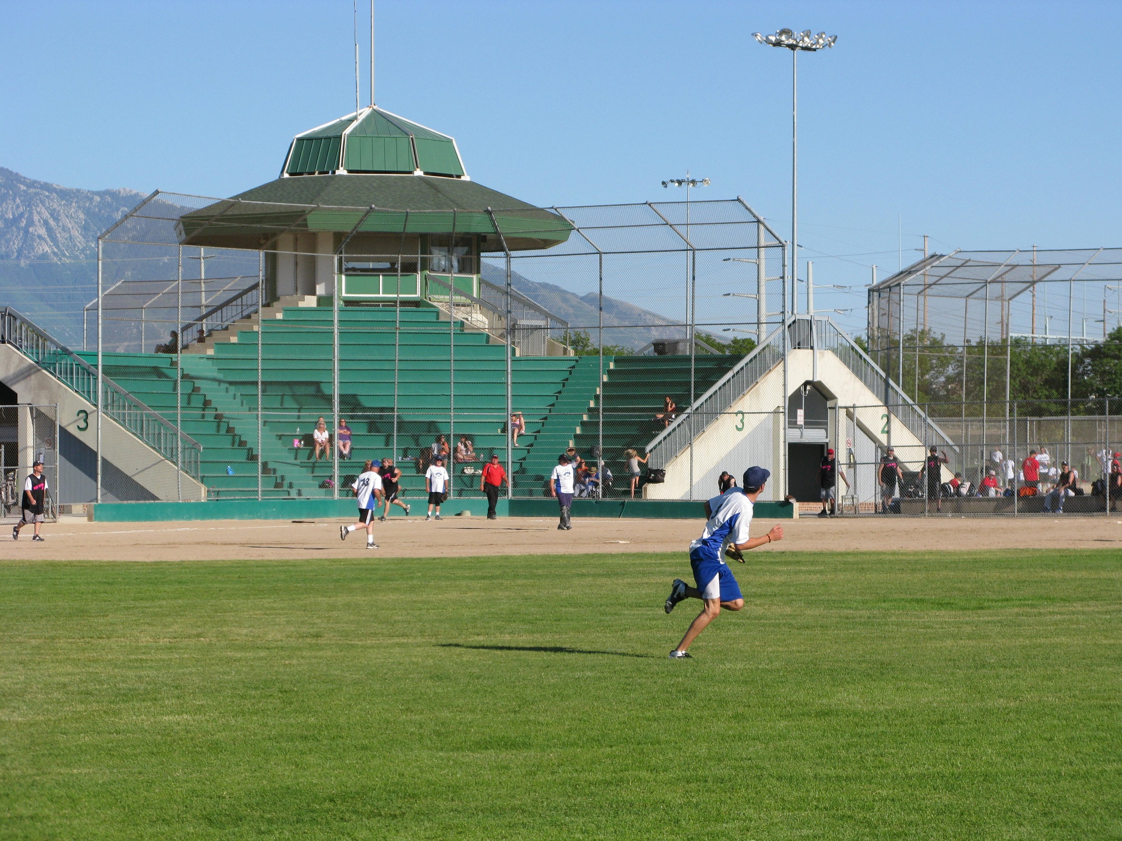 A group of people playing football.