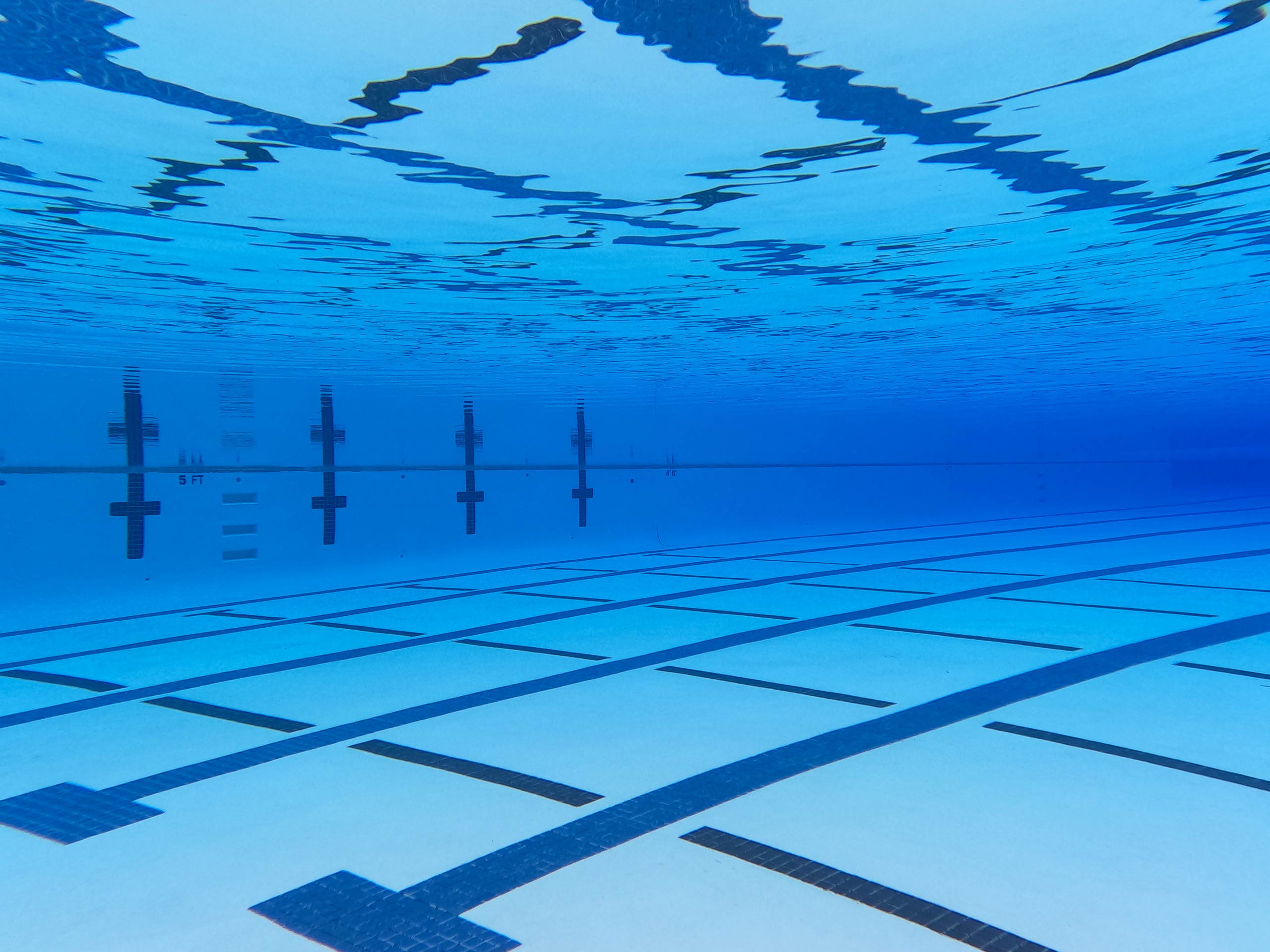 Underwater view of the lap lanes at South County Outdoor Pool in Riverton, Utah.