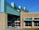 A building with a glass front.